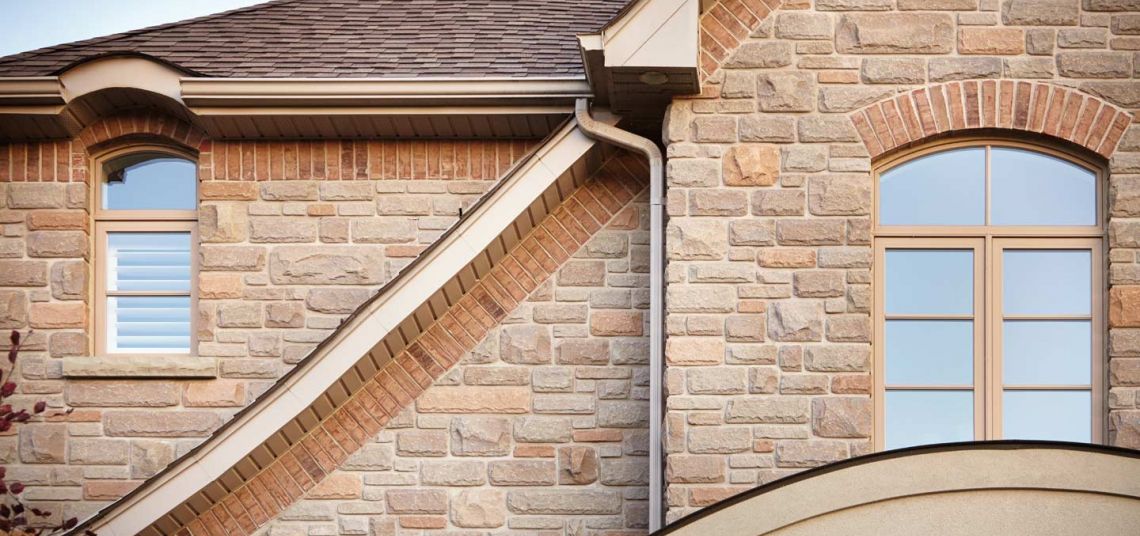 Custom brickwork, cultured stone and natural stonework for an estate home.